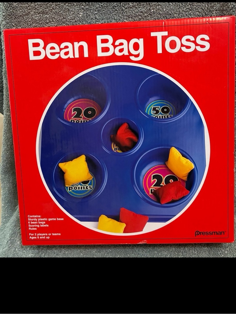 Bean Bag Toss “Pressman”. Game involves throwing color bags into score holes.